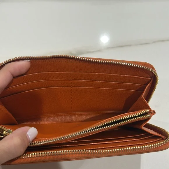 Prada Orange zipper wallet